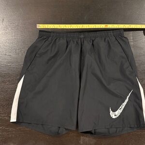 Nike Men's Black Athletic Shorts with White Swoosh